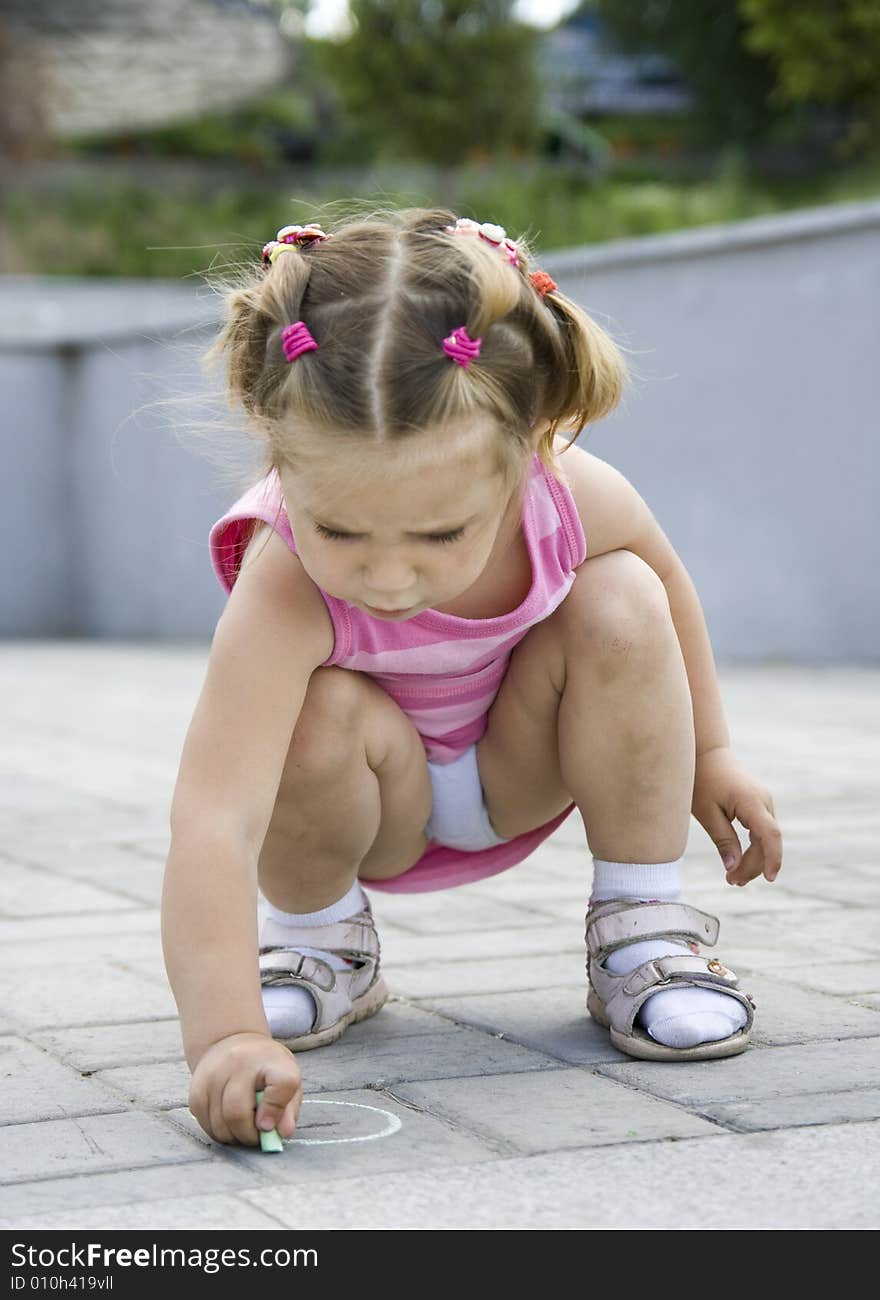 A little cute girl playing