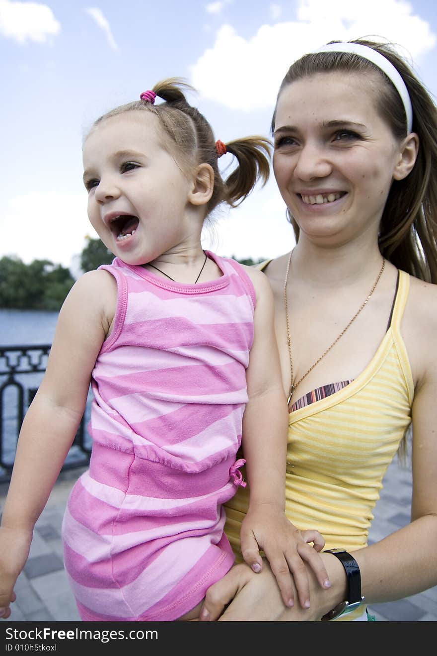 Smiling mother with her daughter. Smiling mother with her daughter