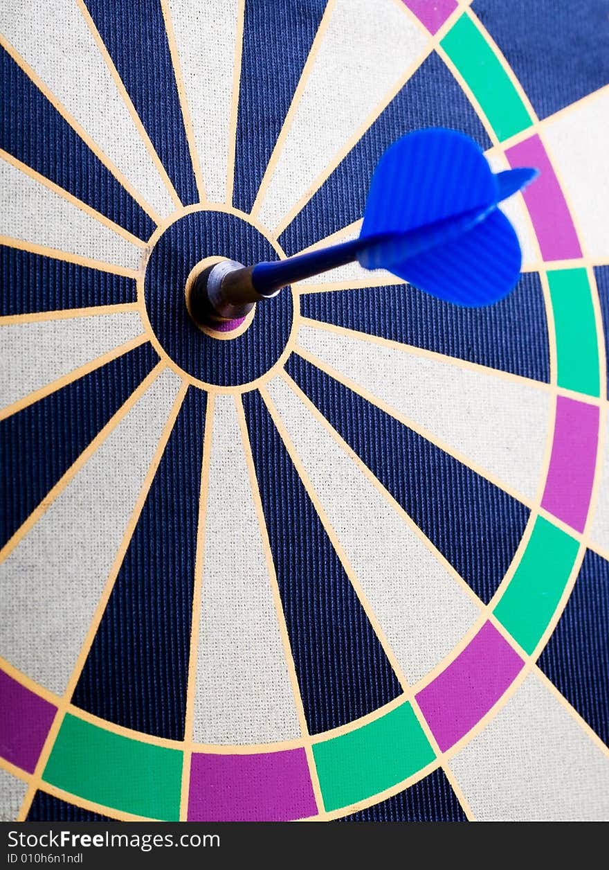 Magnetic dart board with darts