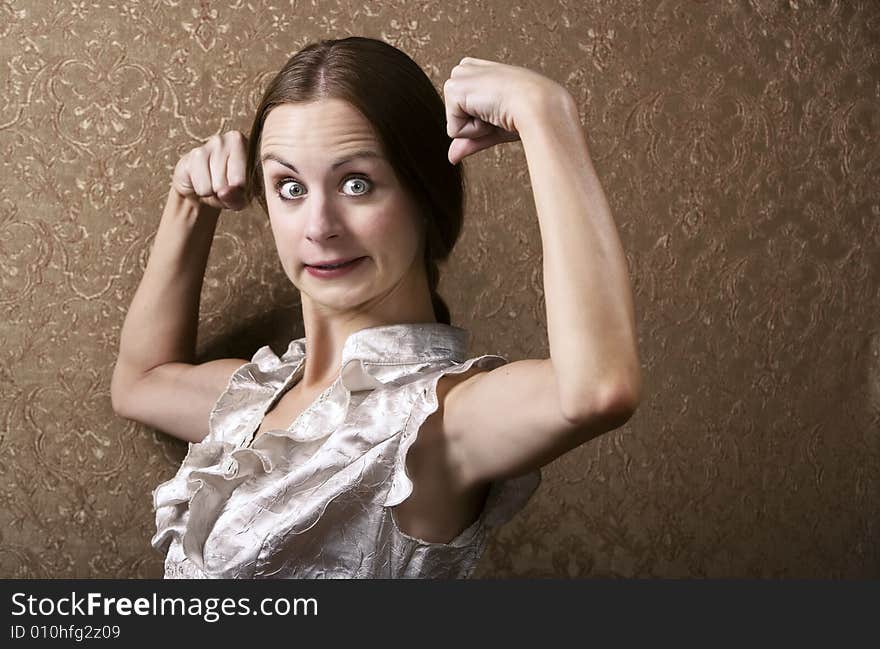 Young Woman Flexing Her Biceps