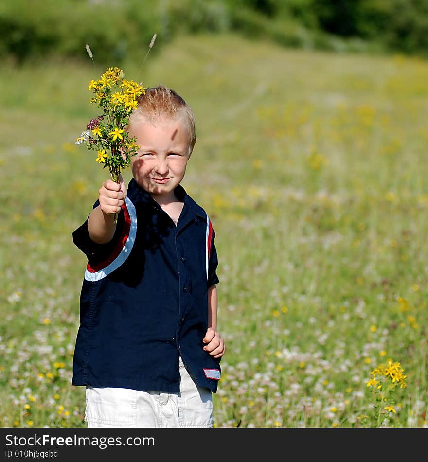 Boy with bouquet of flowers