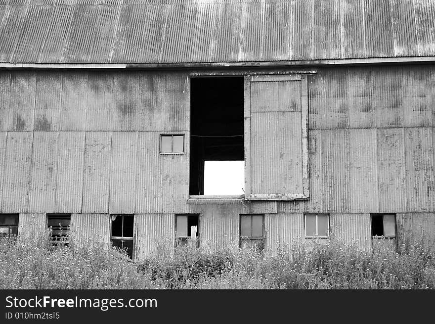 Black and white picture of an open barn door