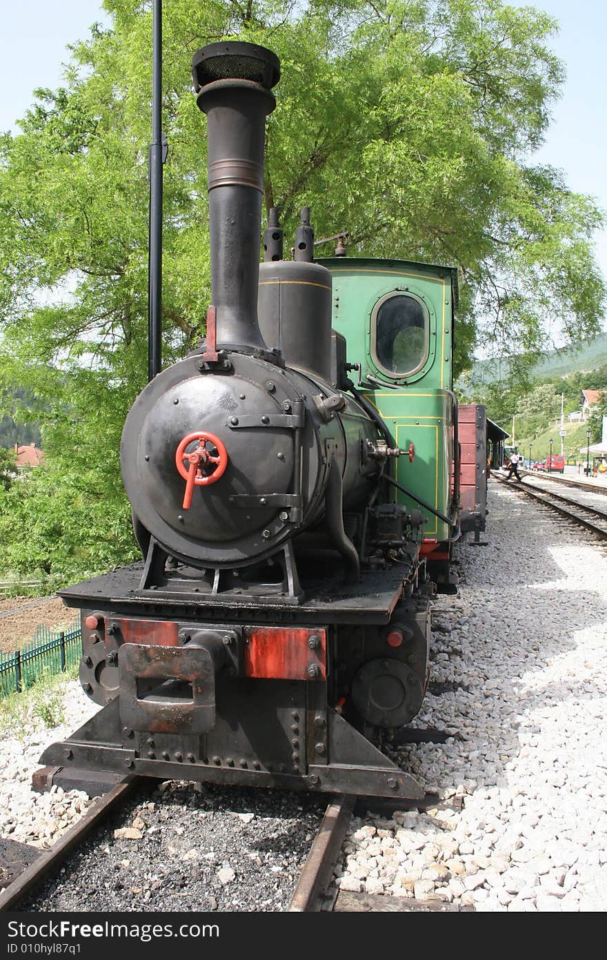 Locomotive on mokra gora on a sunny day