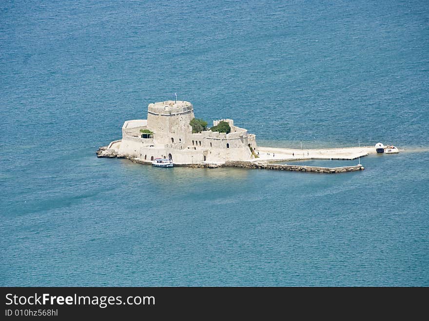 View of the Bourtzi Castle situated in front of the city of Nafplion in the Peloponnese, Greece.