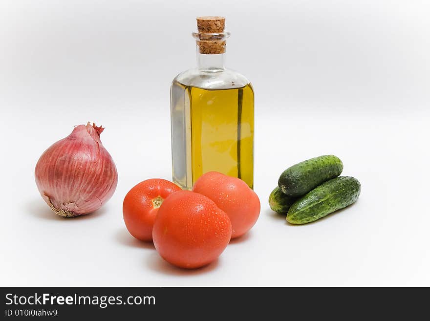 Onion, tomatoes, a bottle of oil - all for salad