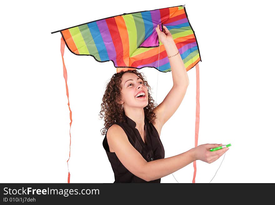 Young woman with kite on white