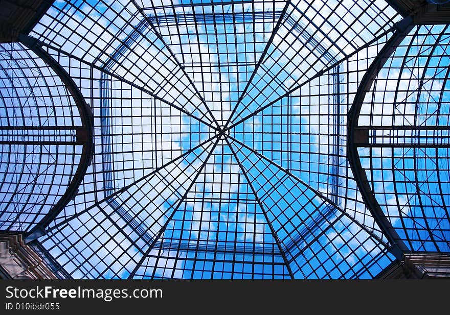 Trellised glazed dome, sky background