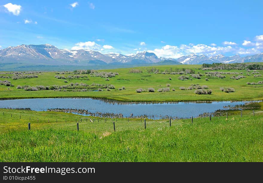 Mountains, meadows and pond