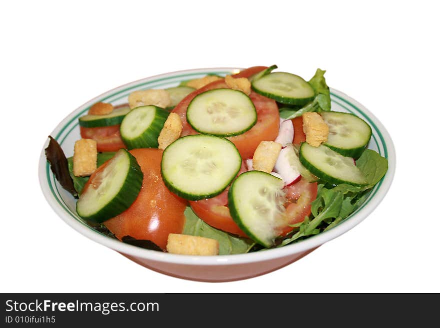 Isolated bowl of green salad with various greens, cucumber, tomato, radish and croutons. With clipping path. Isolated bowl of green salad with various greens, cucumber, tomato, radish and croutons. With clipping path.