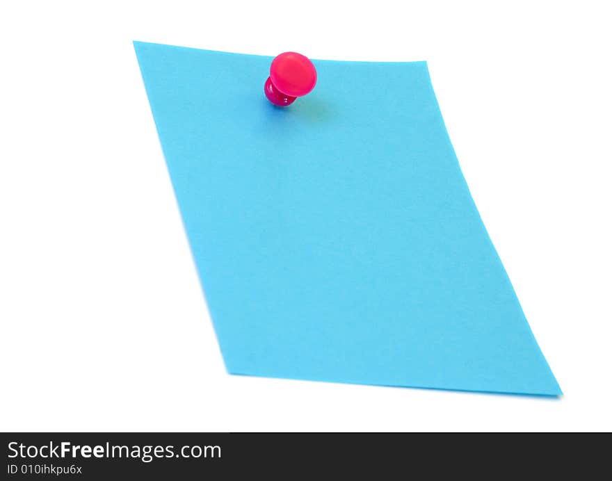 Blue note paper held by a red tack, isolated on white with copy space. Blue note paper held by a red tack, isolated on white with copy space.