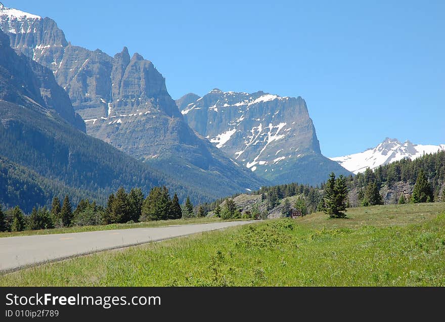 The 8-km scenic drive to the entrance of waterton lake national park, alberta, canada. The 8-km scenic drive to the entrance of waterton lake national park, alberta, canada