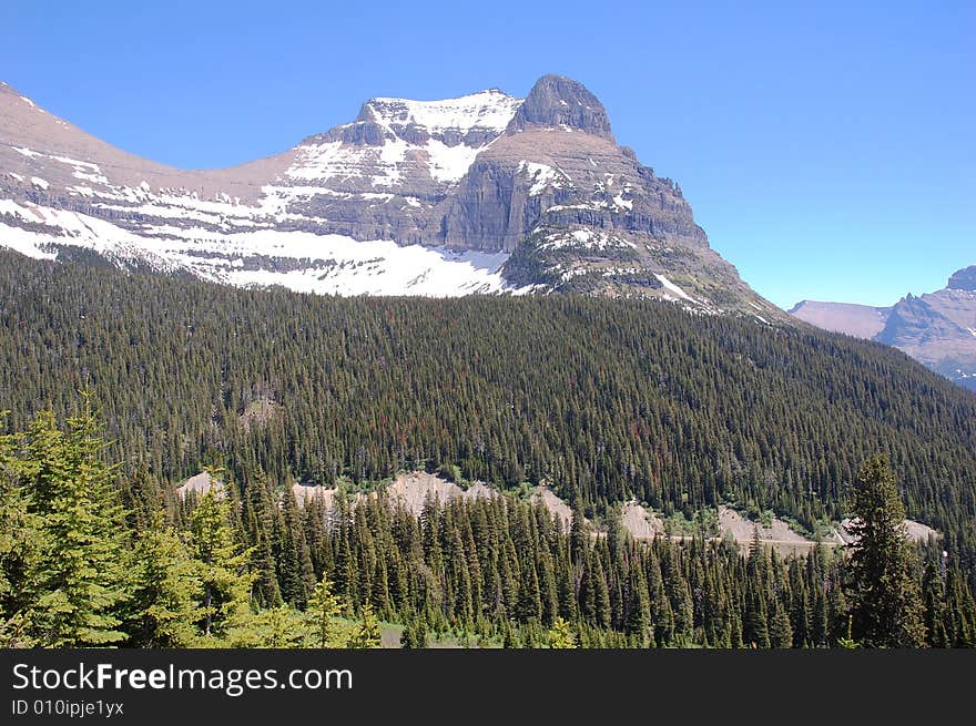 Rocky mountain and hillside forests in glacier national park, montana, united states. Rocky mountain and hillside forests in glacier national park, montana, united states