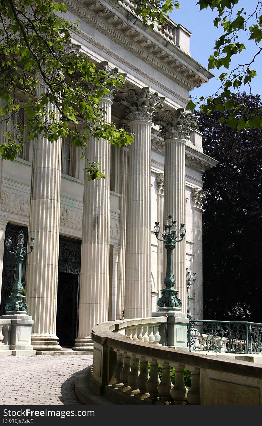 Four stone concrete columns with ornate pedestals. Four stone concrete columns with ornate pedestals