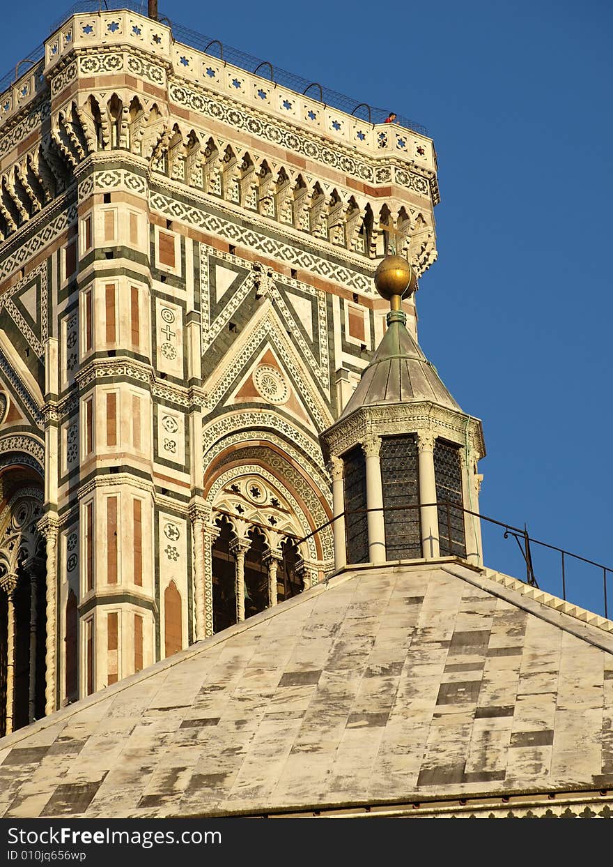 A glimpse of the Baptistery skylight and the top of the Giotto's bell tower. A glimpse of the Baptistery skylight and the top of the Giotto's bell tower