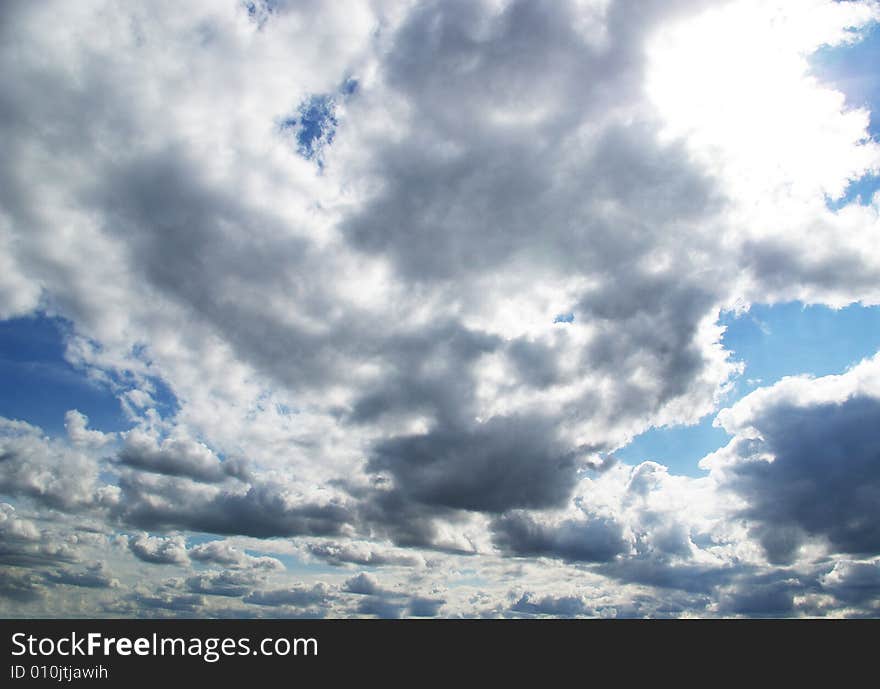 Gray clouds in a blue sky