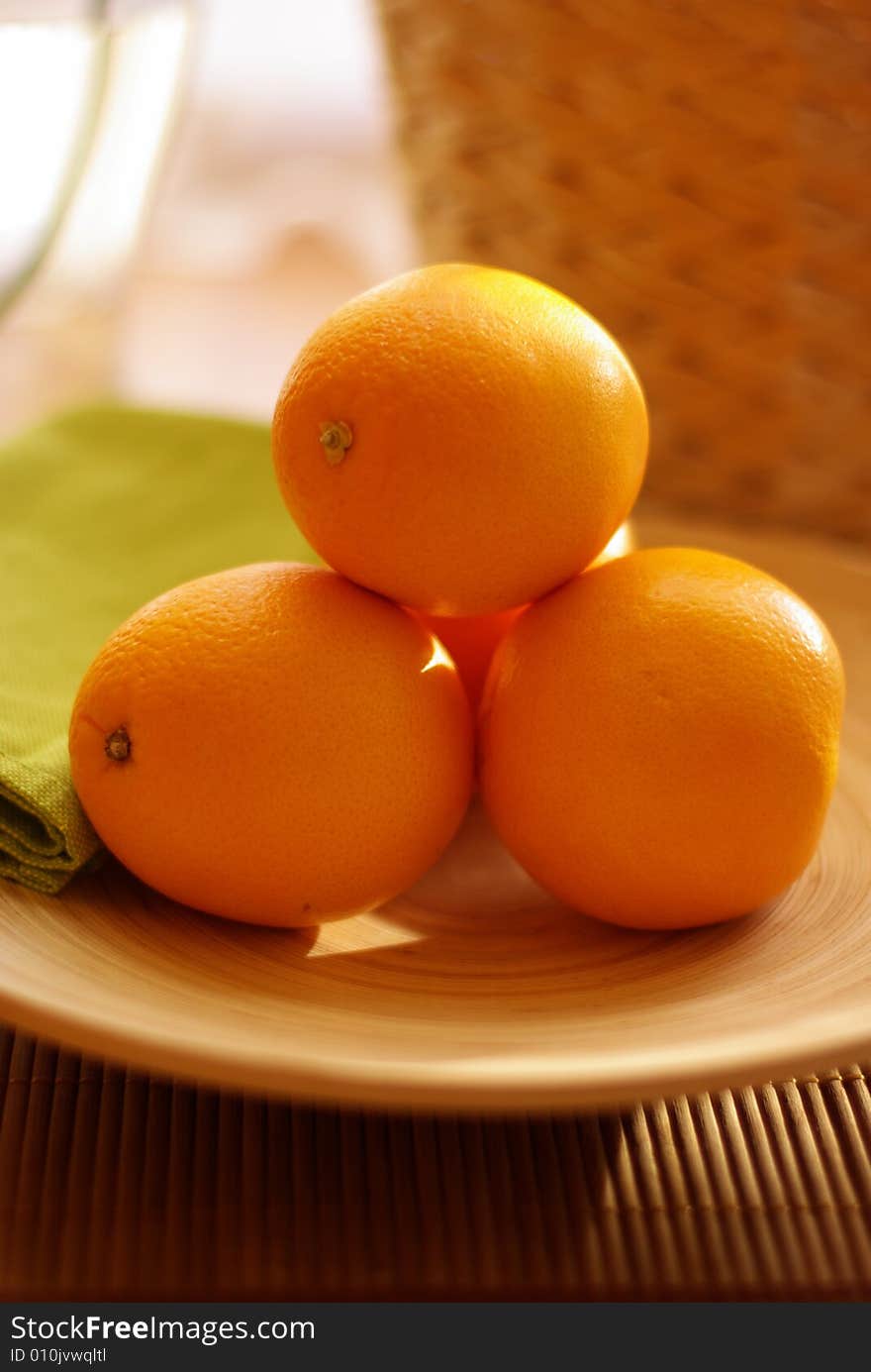 oranges on the table 
in the kitchen