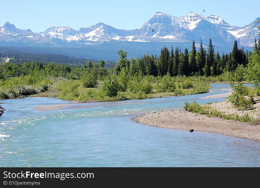 Mountains and river in waterton lakes national park, alberta, canada