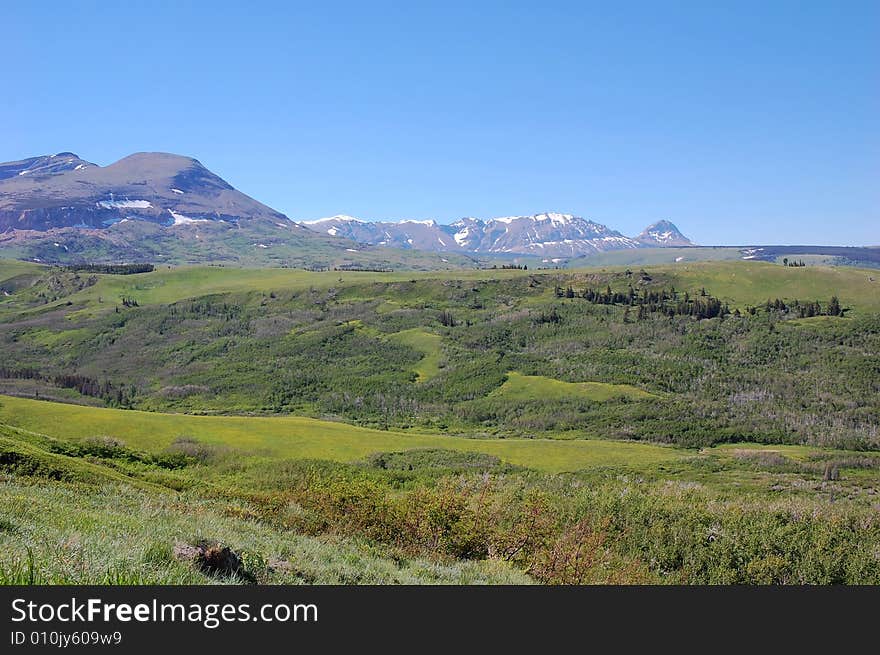 Mountains and hillside grassland in waterton lakes national park, alberta, canada. Mountains and hillside grassland in waterton lakes national park, alberta, canada