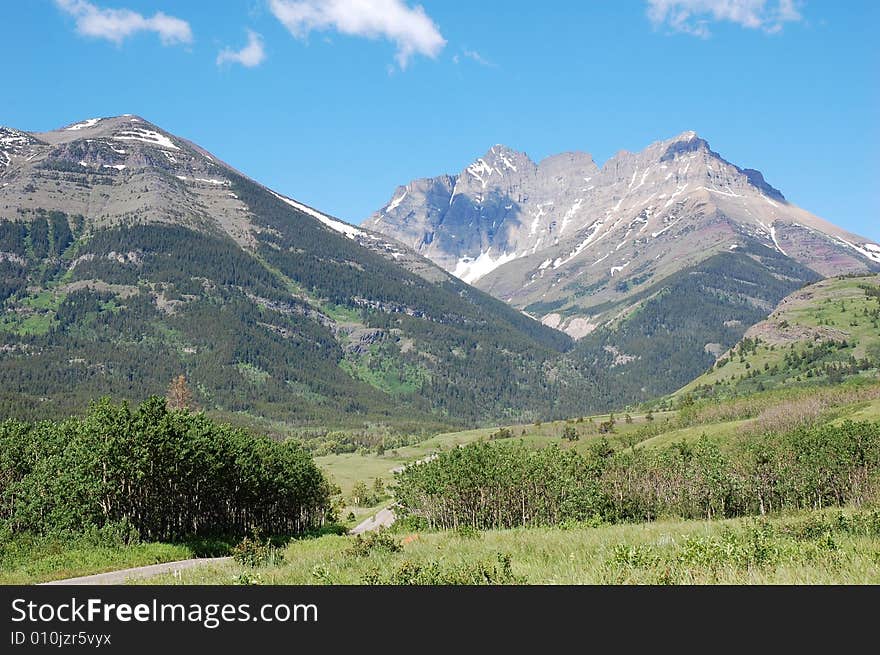 Mountains and hillside grassland in waterton lakes national park, alberta, canada. Mountains and hillside grassland in waterton lakes national park, alberta, canada