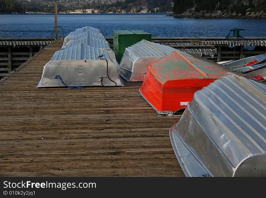 Wide Docked Orange Boat