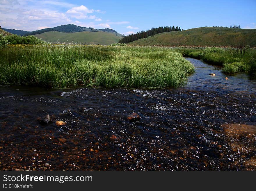 Stanley Creek as it flows through high mountain meadow, Stanley Idaho. Stanley Creek as it flows through high mountain meadow, Stanley Idaho