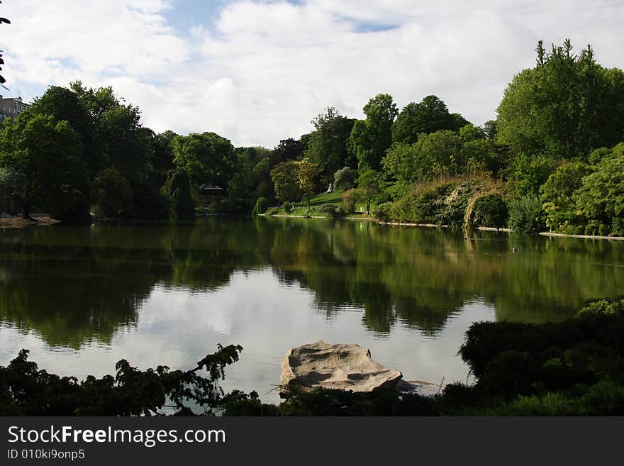 French garden with pond in foreground