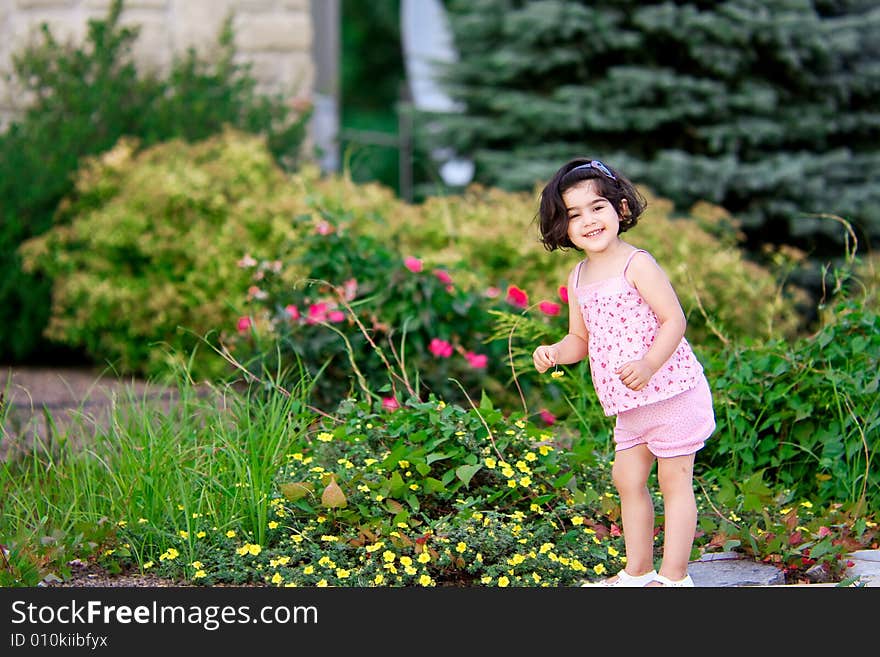 Girl in flower garden