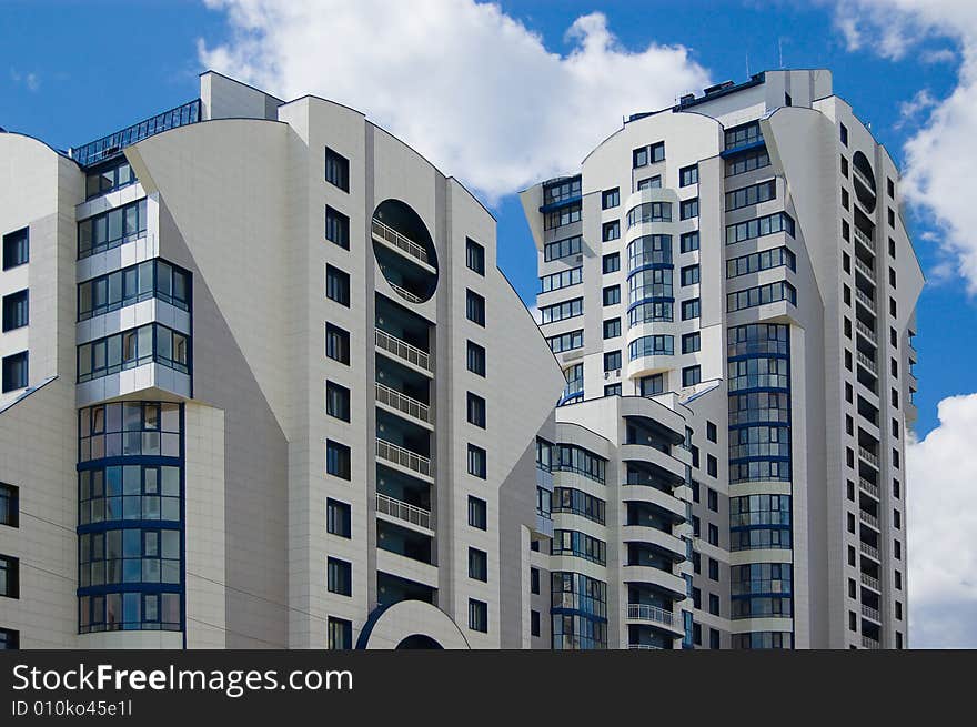 New multistory house in a city with city and sky background. New multistory house in a city with city and sky background