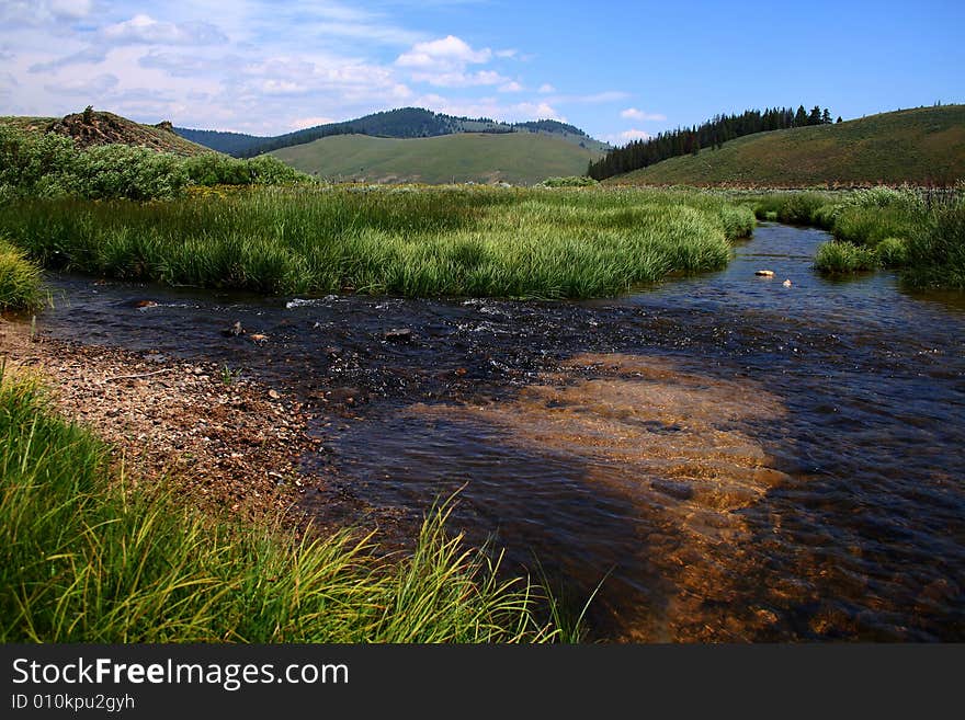 Stanley Creek as it flows through high mountain meadow, Stanley Idaho. Stanley Creek as it flows through high mountain meadow, Stanley Idaho