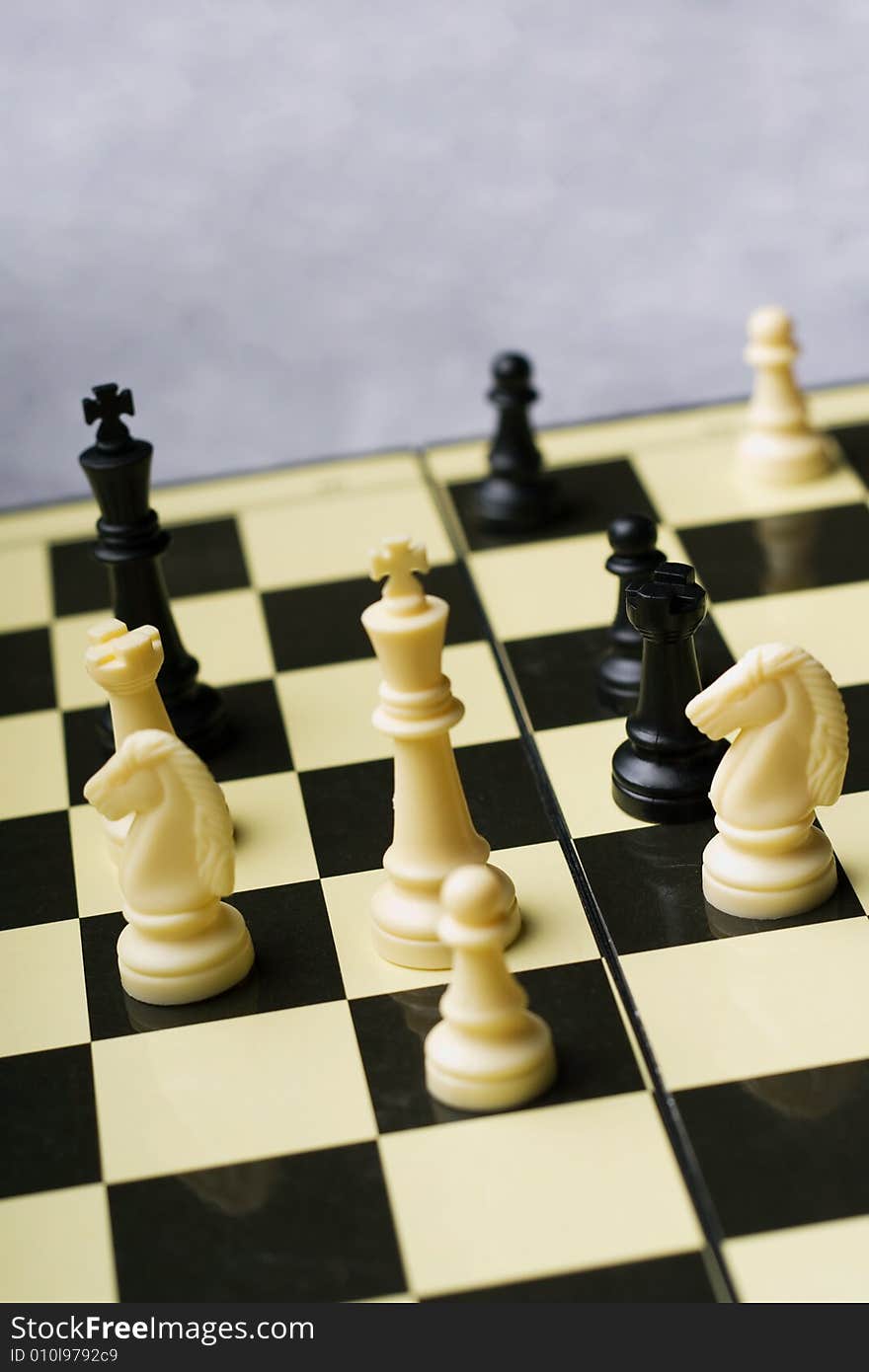 A close-up view of a chess board game. A close-up view of a chess board game.