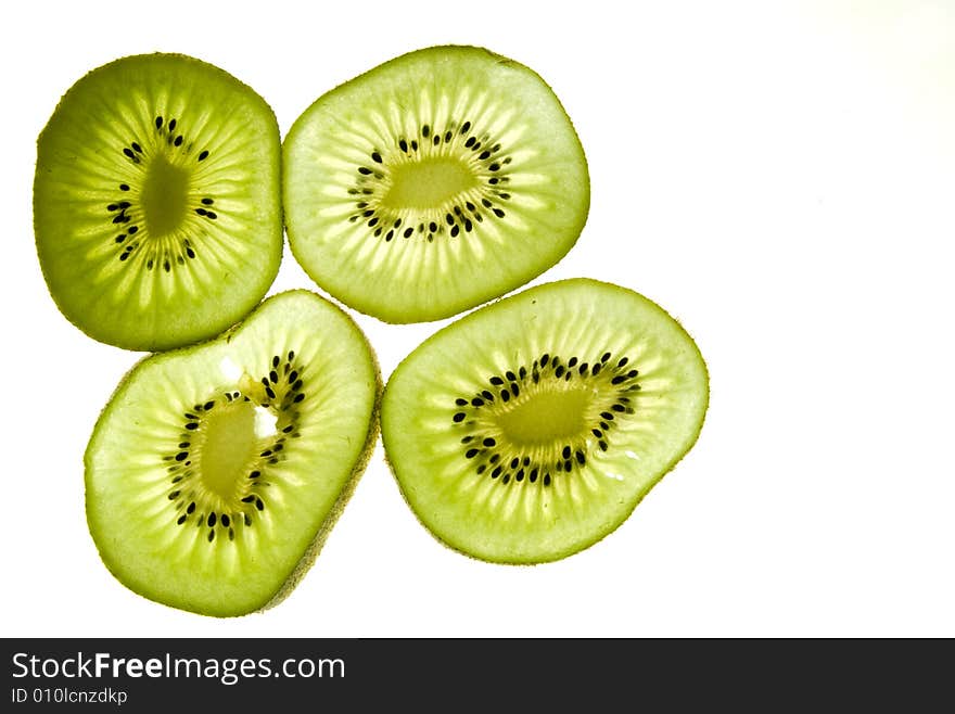 Kiwi slices isolated on white