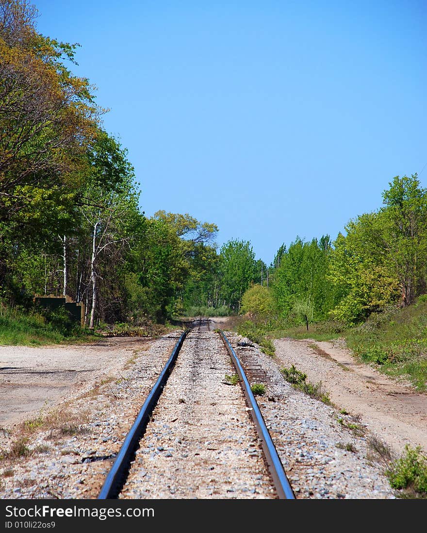 A fantastic place where this old abandoned rails of the train cargo carriers from the past, coming into Ludington, Michigan.  This town is very historic with a diverse train rail system. A fantastic place where this old abandoned rails of the train cargo carriers from the past, coming into Ludington, Michigan.  This town is very historic with a diverse train rail system.