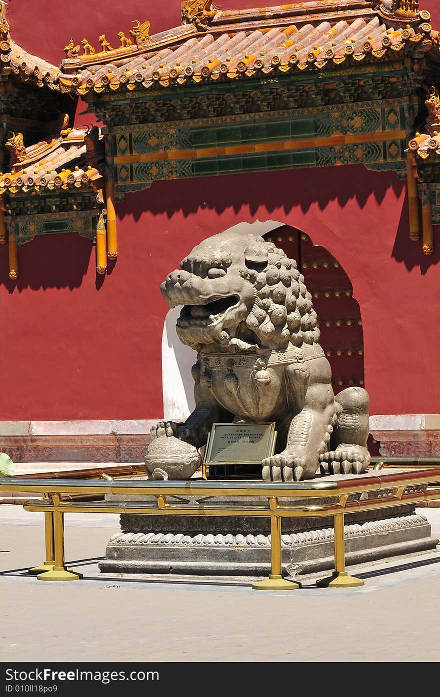 Stone lion in the ancient door