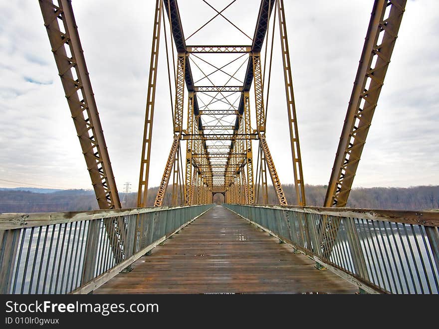 View of footbridge over reservoir for hikers and bikers.