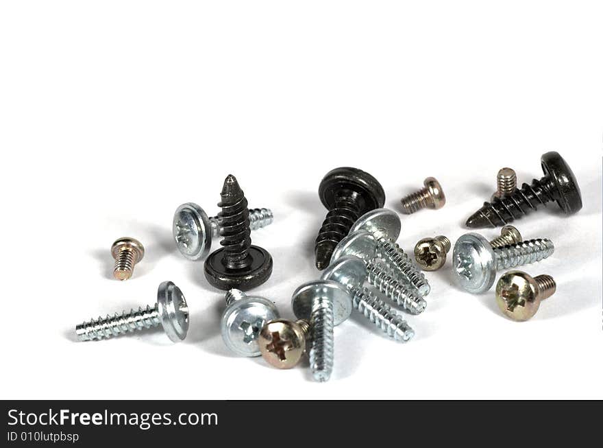 Close up of some screws isolated on white