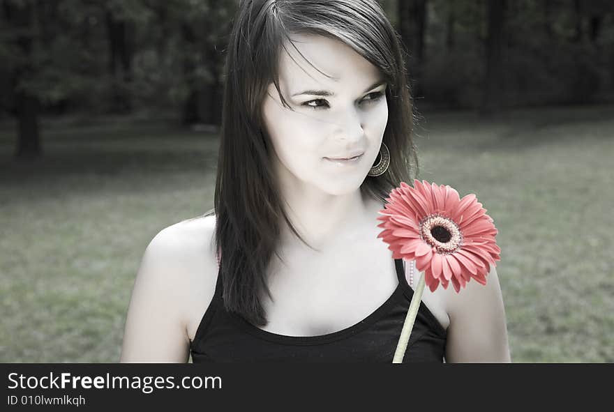 Woman With Red Flower Outdoors