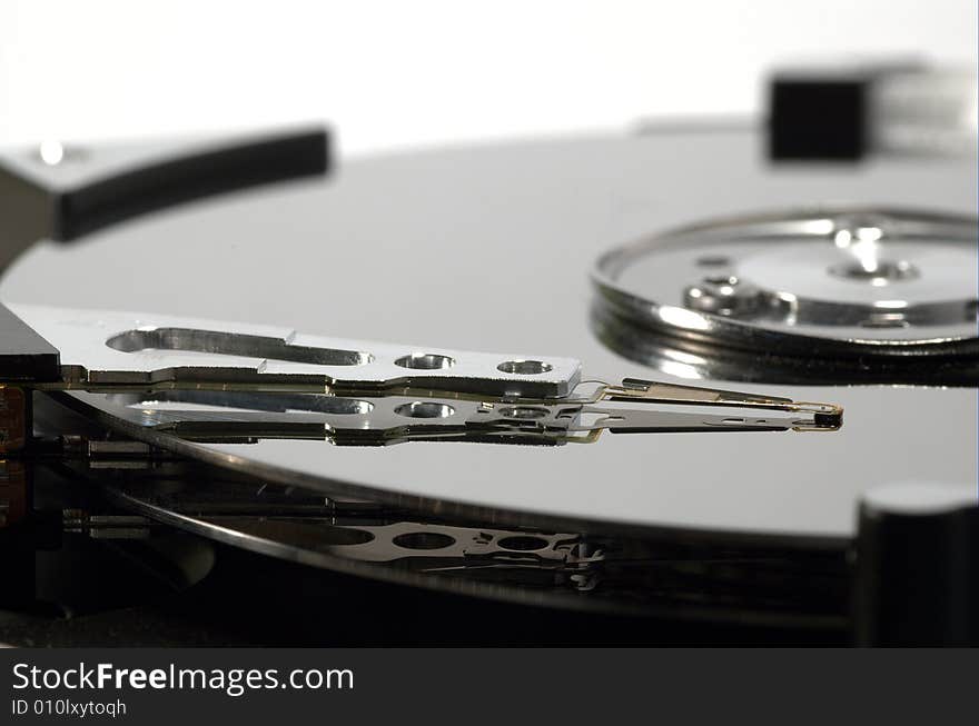 Close up  of an opened hard disk. Close up  of an opened hard disk