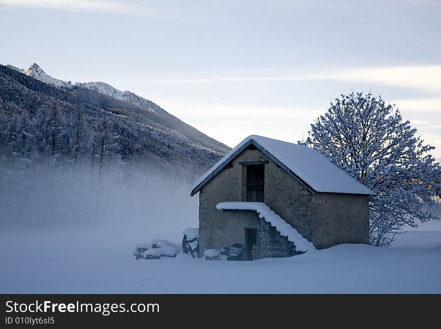 A snowy winter scene with refuge. A snowy winter scene with refuge