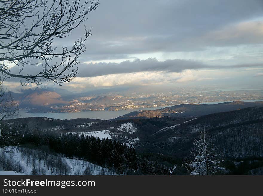 A snowy winter landscapes with lake. A snowy winter landscapes with lake