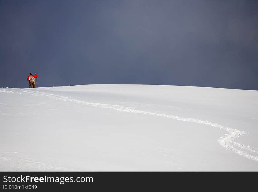 A snowy winter scene with skier. A snowy winter scene with skier