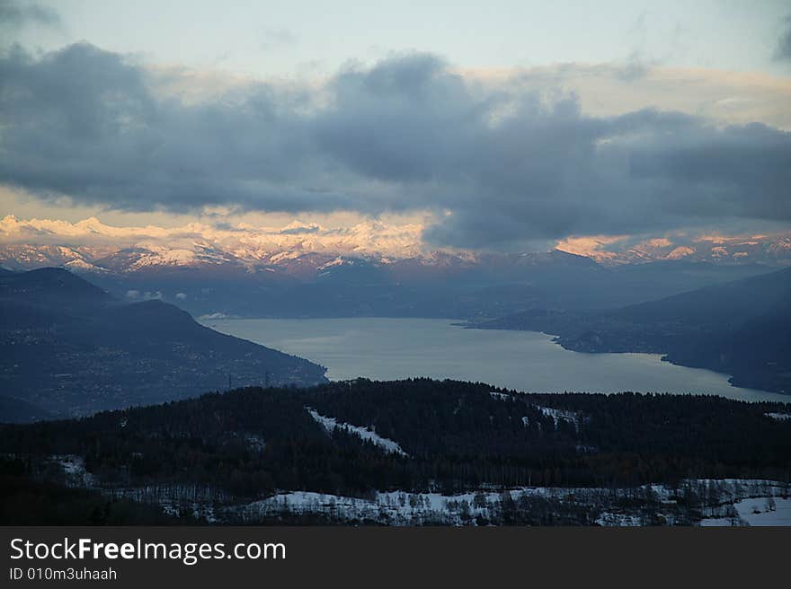 A snowy winter landscapes with lake. A snowy winter landscapes with lake