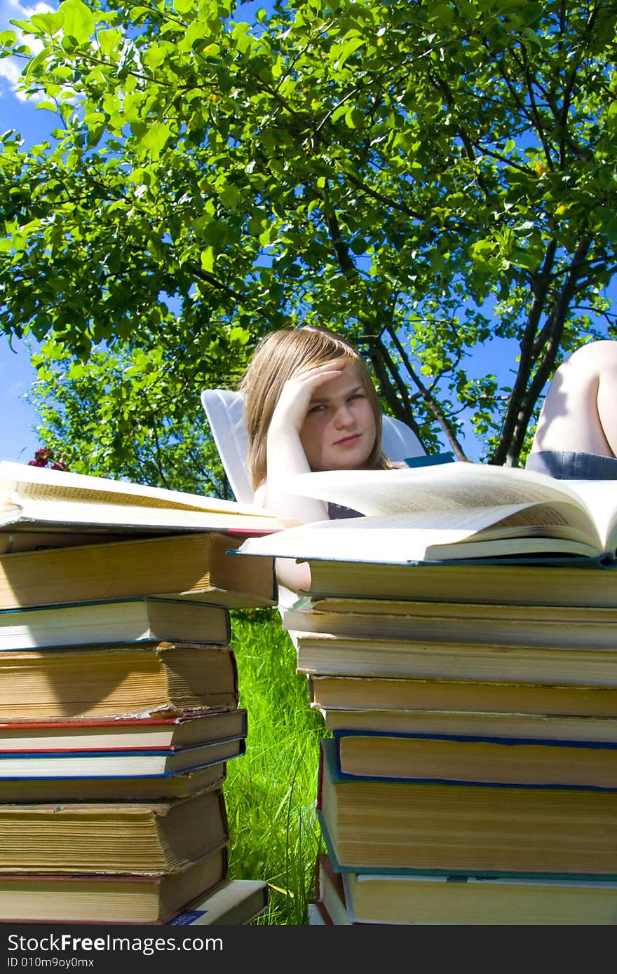 The young attractive student with the book. The young attractive student with the book