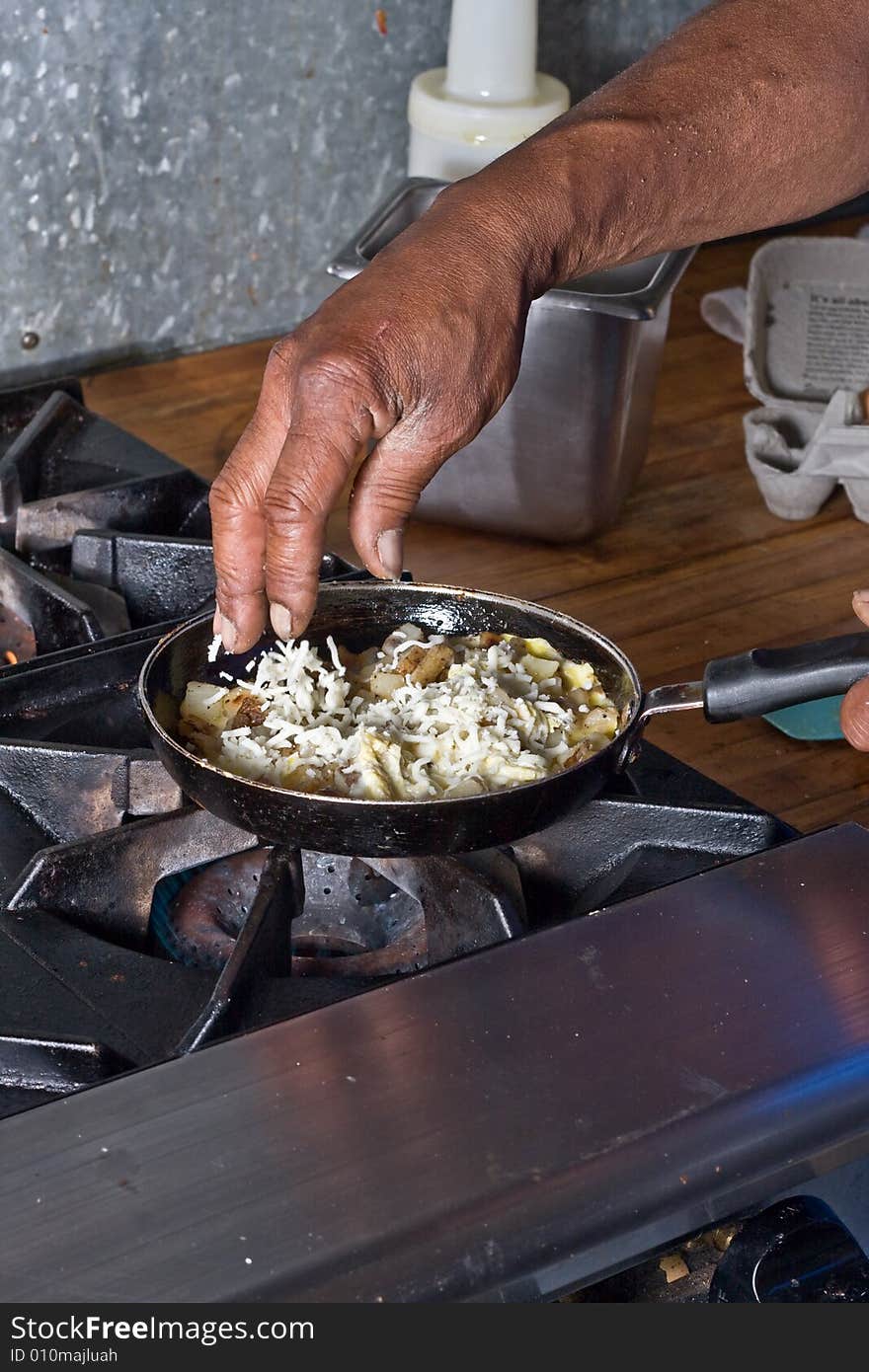 2 pans on cook stove,. 2 pans on cook stove,