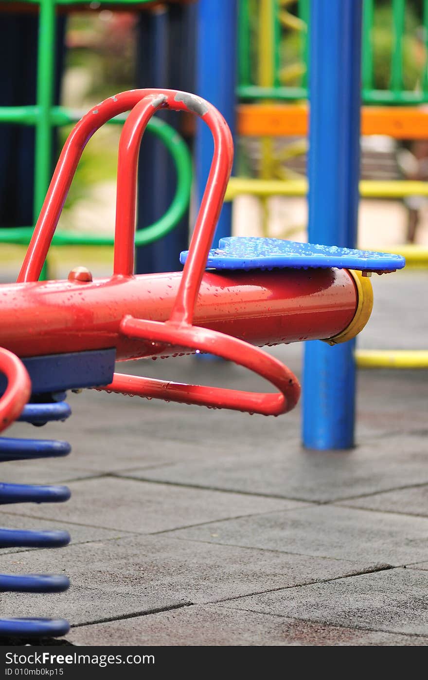 At a playground filled with laughter and fun. At a playground filled with laughter and fun