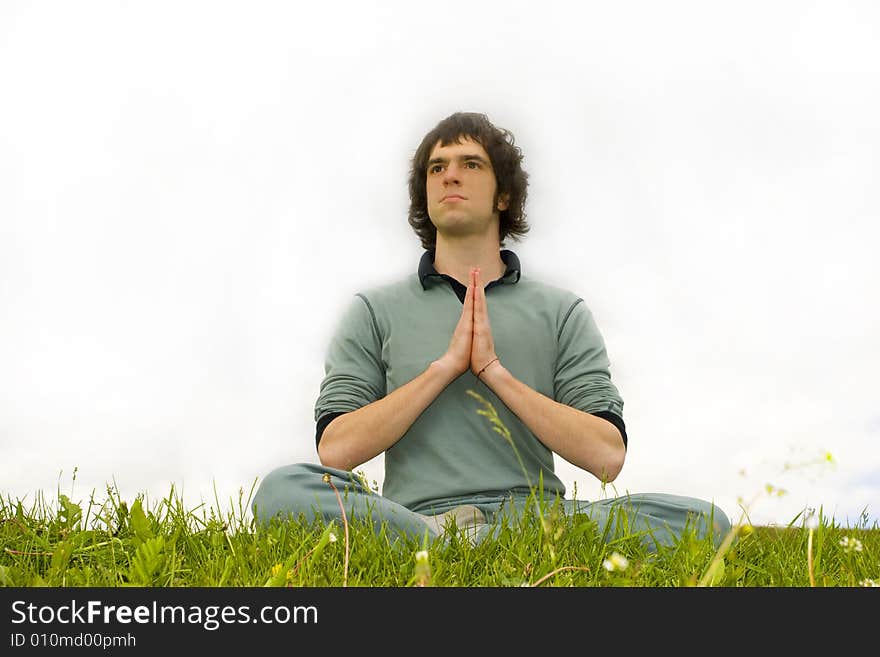 A Man Sitting In The Lotus Posture