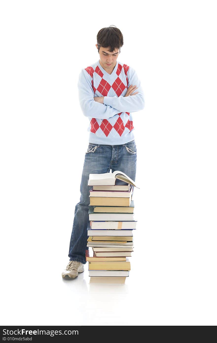 The young student with the books isolated on a white background