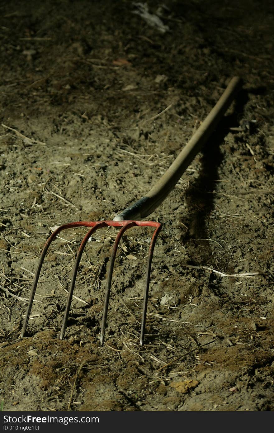 A red fork and dirt terrain.