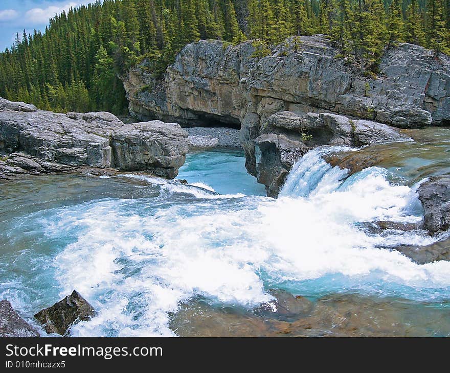 Picture taken from a rock on the shallow end of the elbow falls river. From Alberta, Canada. Picture taken from a rock on the shallow end of the elbow falls river. From Alberta, Canada