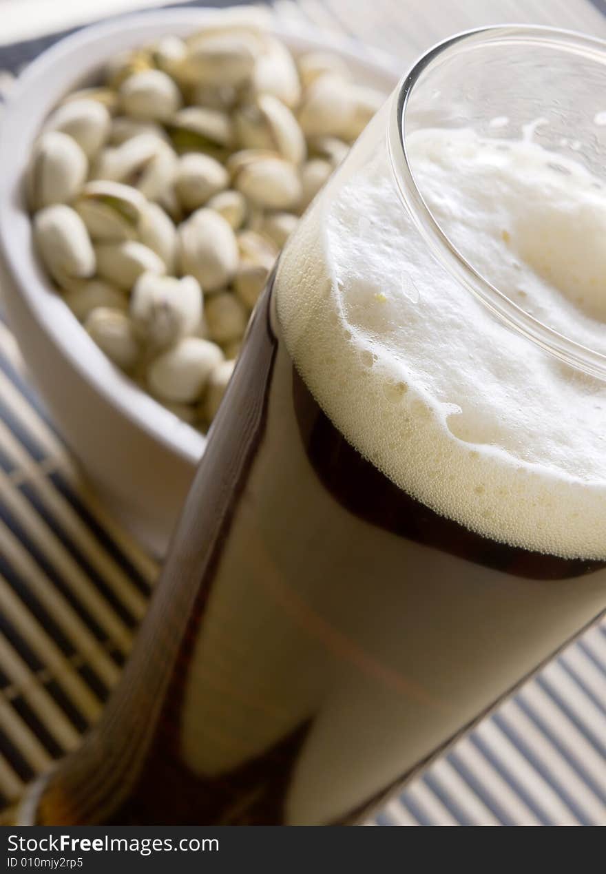 Beer with salty pistachio