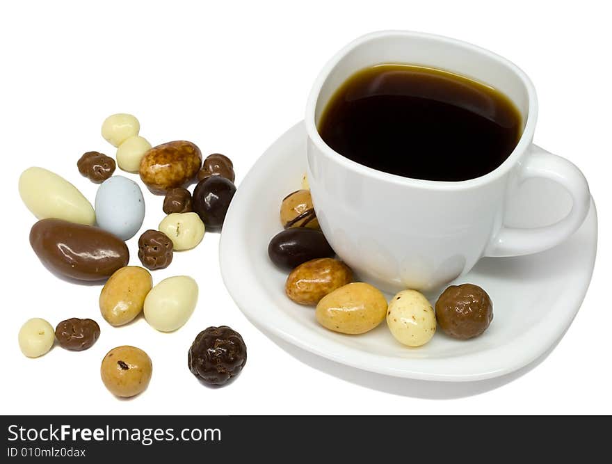 White coffee cup with candies